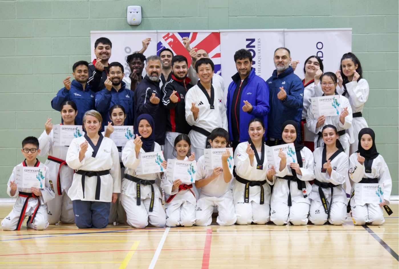 Club members with certificates after a seminar